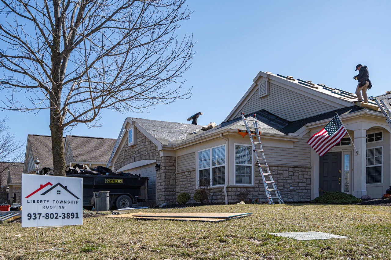 Liberty Township Roofing crew replacing a roof on a Liberty Township home