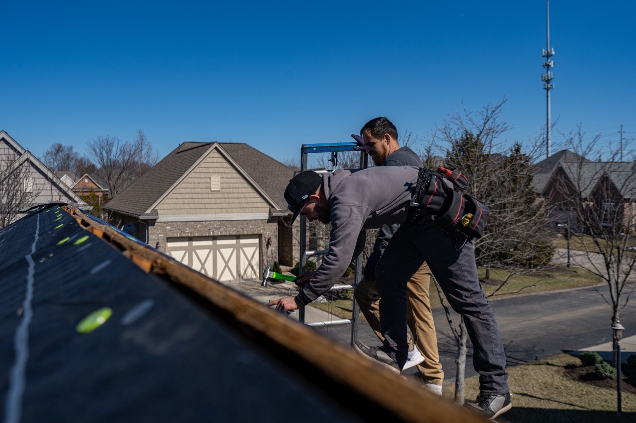 Liberty Township Roofing crew on a roofing project in Mason, OH