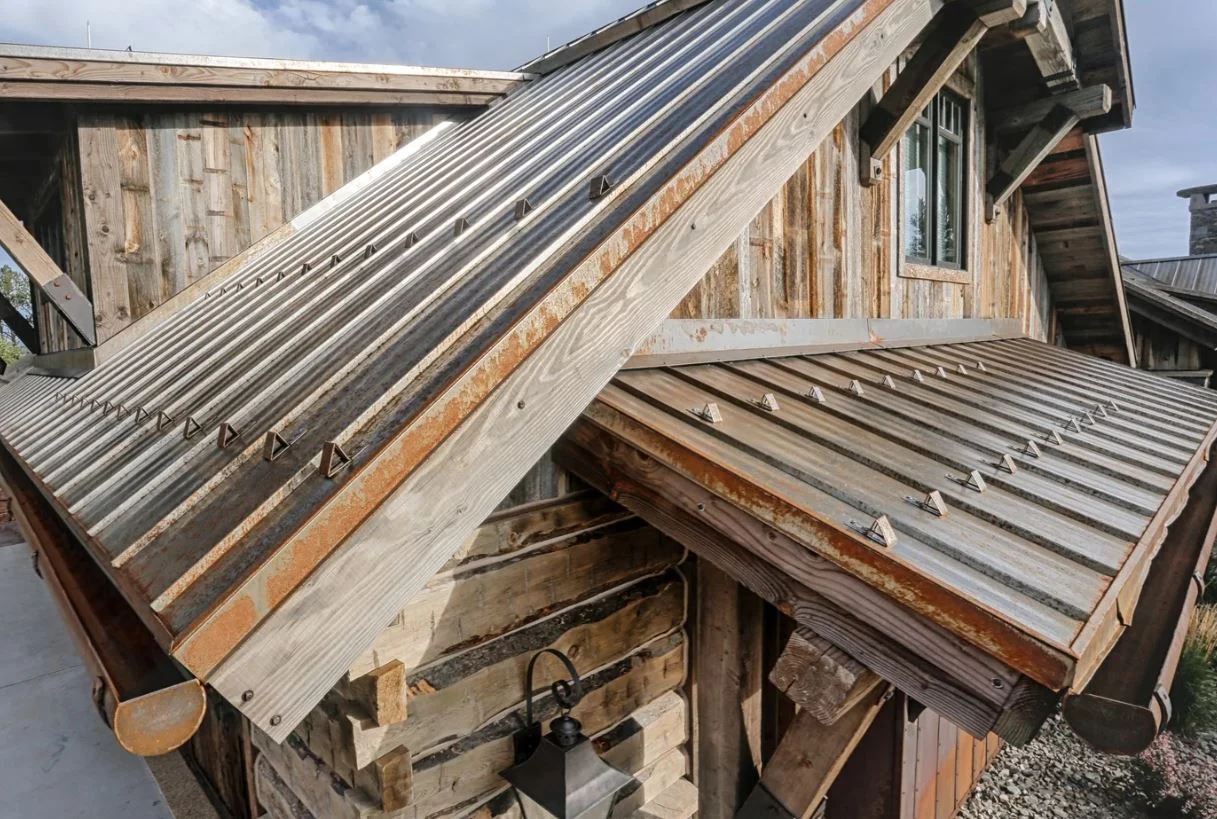 close up of metal roof. image of a corrugated roof also known as exposed fastener.
