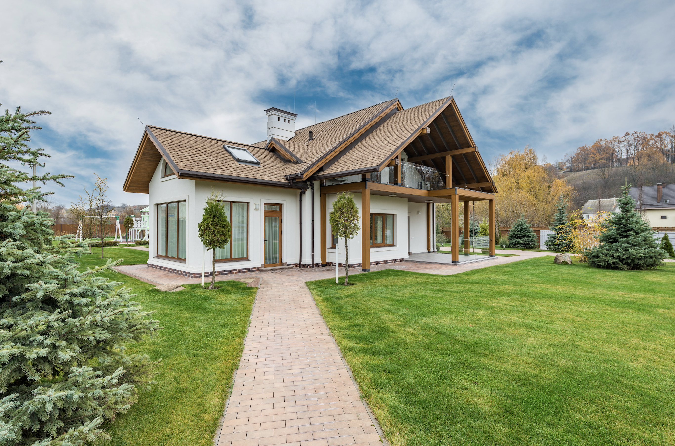 full view of modern house with asphalt roof