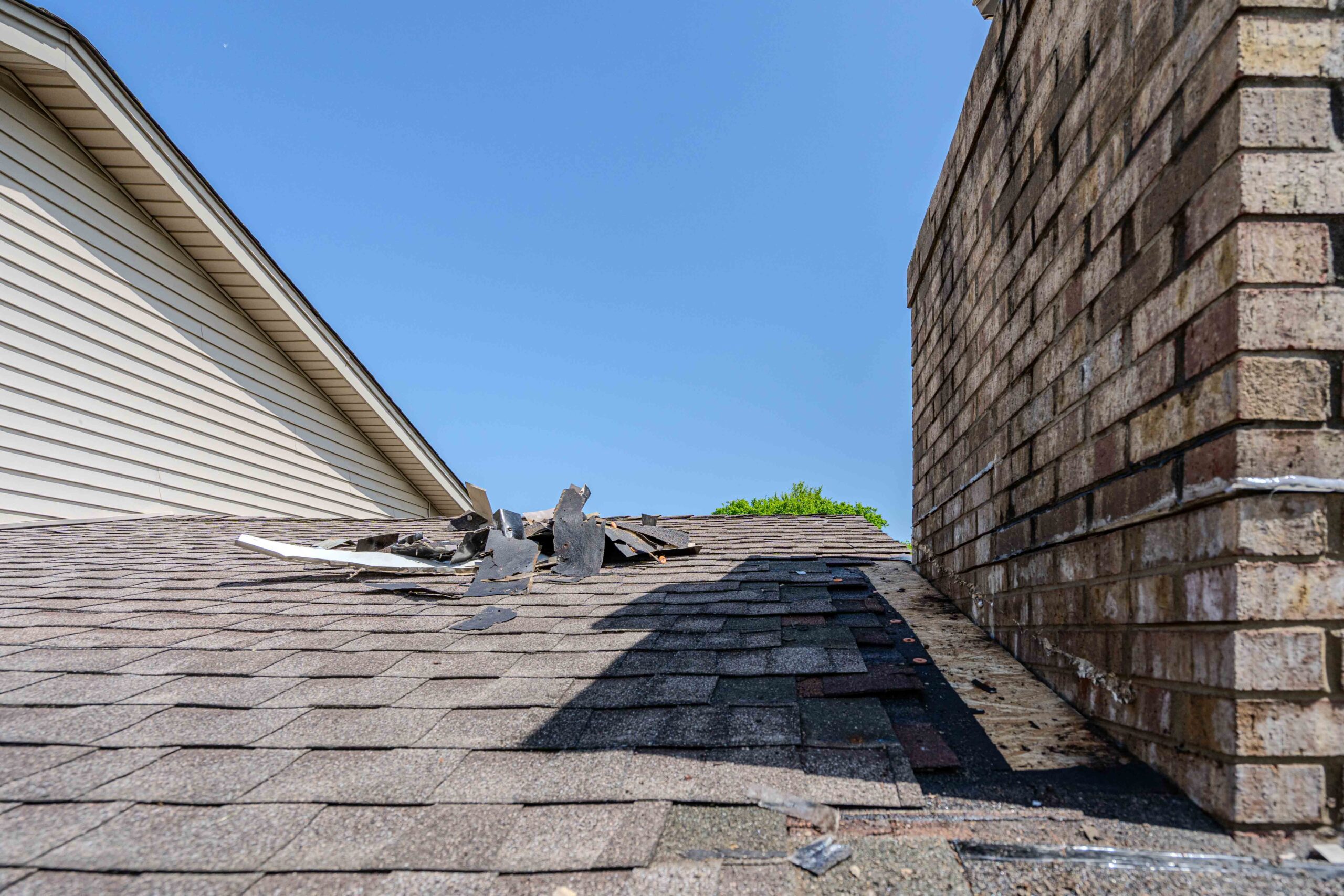 asphalt shingle roof and chimney